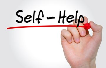 Image that says Self Help with a hand