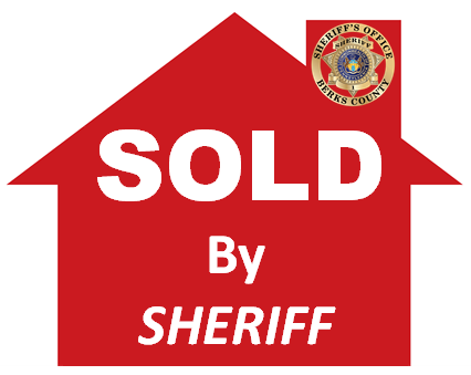 House with Sold by Sheriff on it
