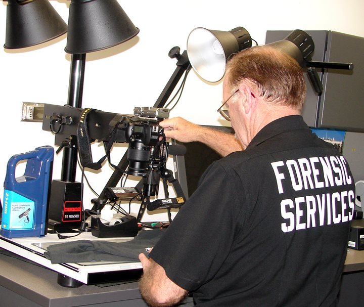 Image of a person working on the AFIS